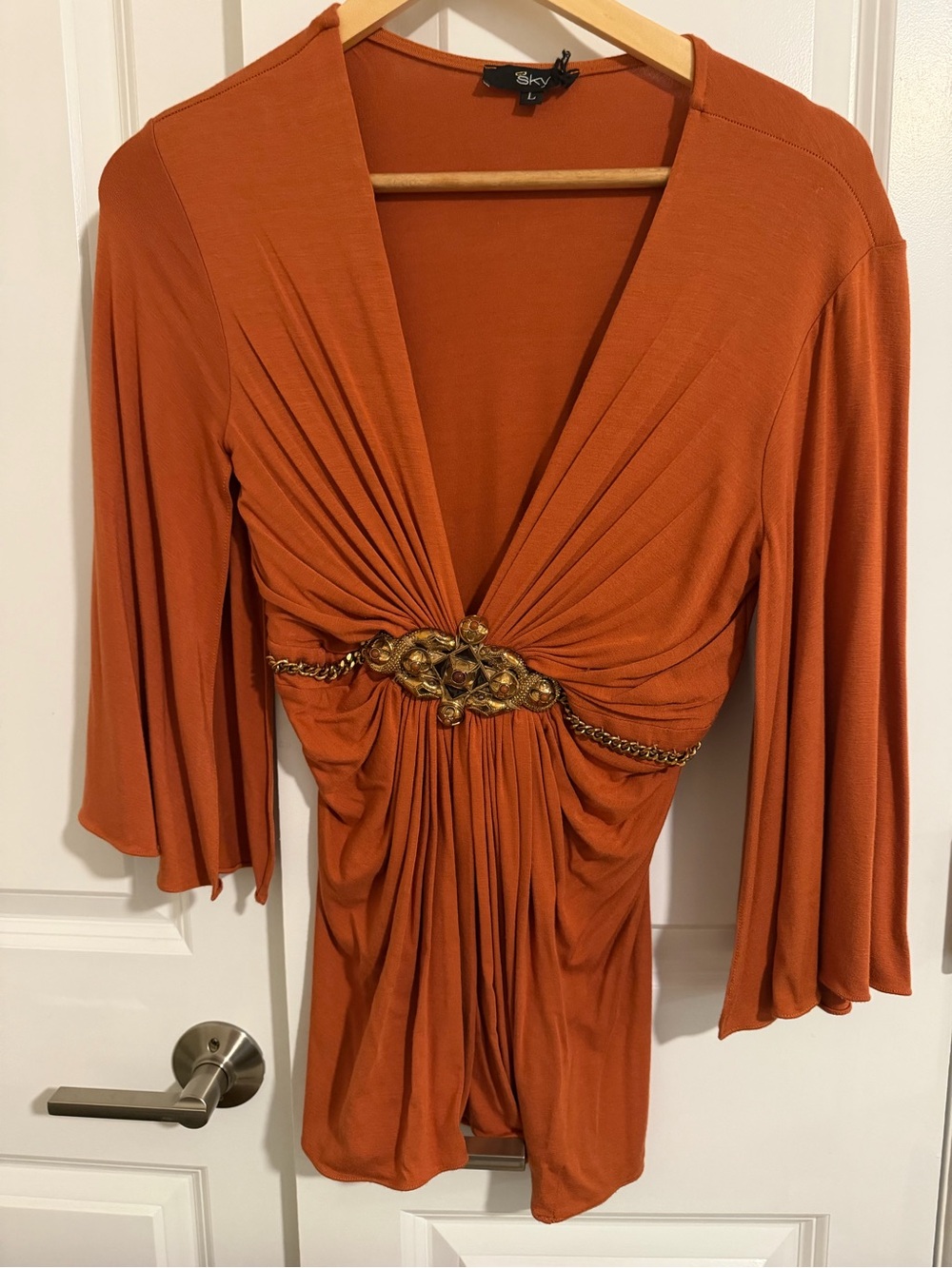 Sky Rust Orange Draped V-Neck Tunic with Gold Chain Accent